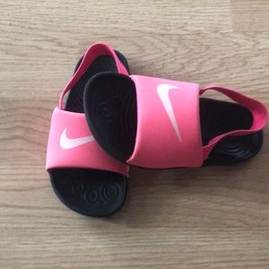 Hot pink Nike sandles